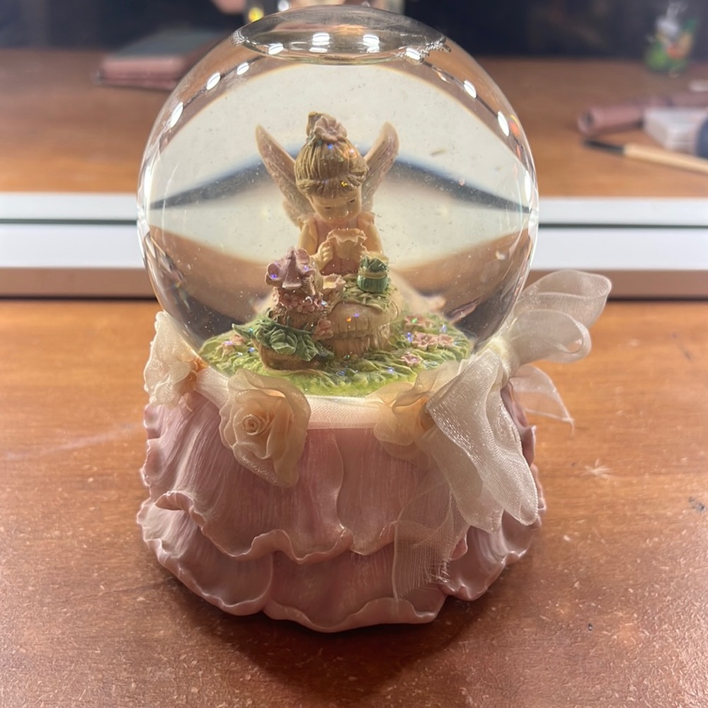 beautiful angel snow globe